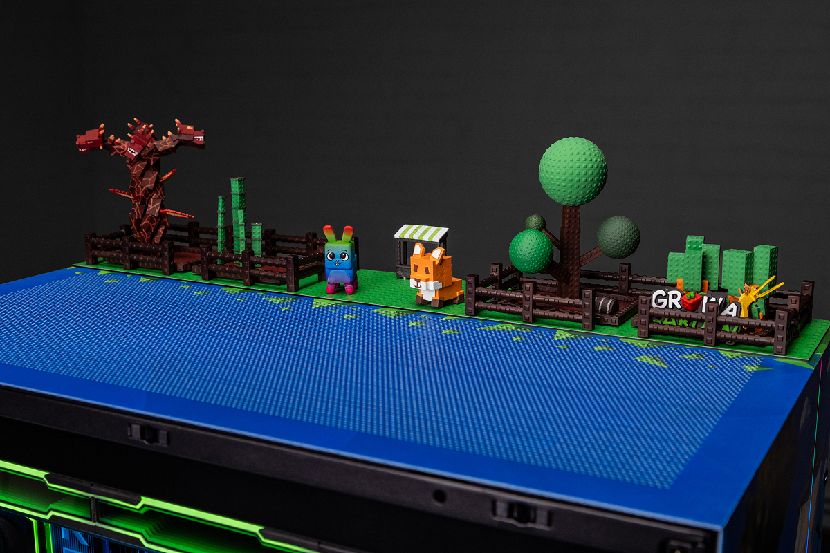 Grow a Garden diorama on top of the Lian Li O11 Dynamic EVO XL case
