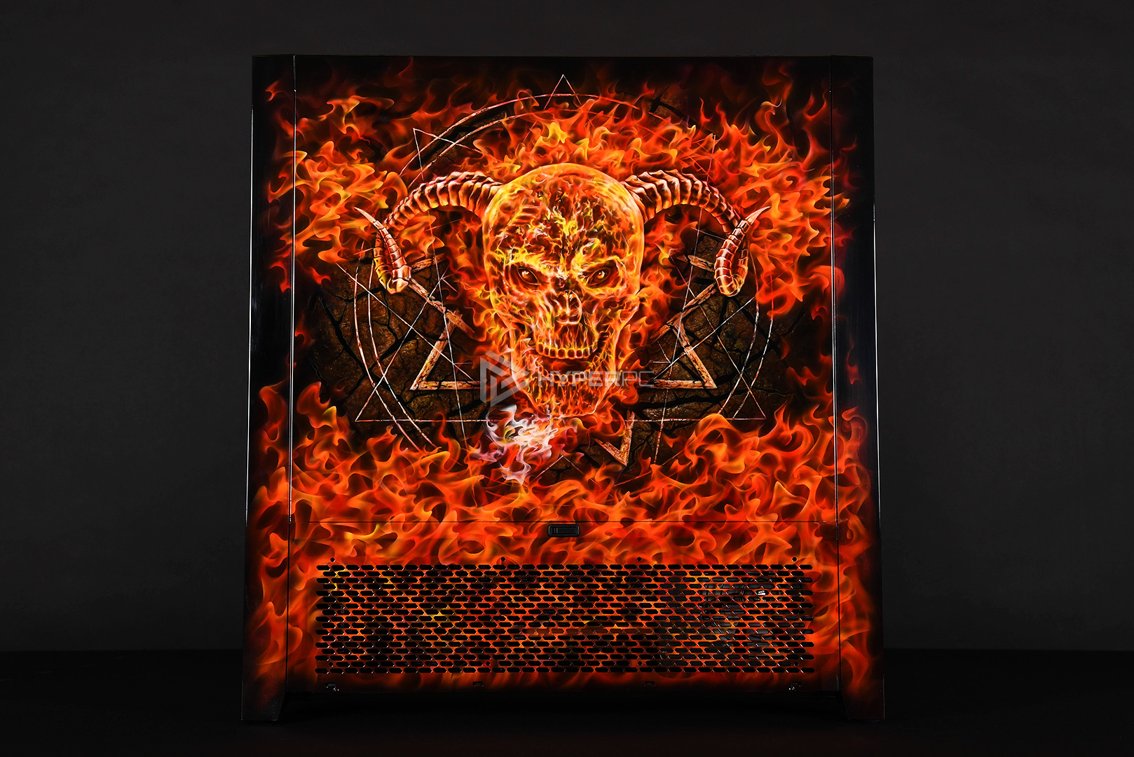 Artistic airbrush with fire artwork on a PC case