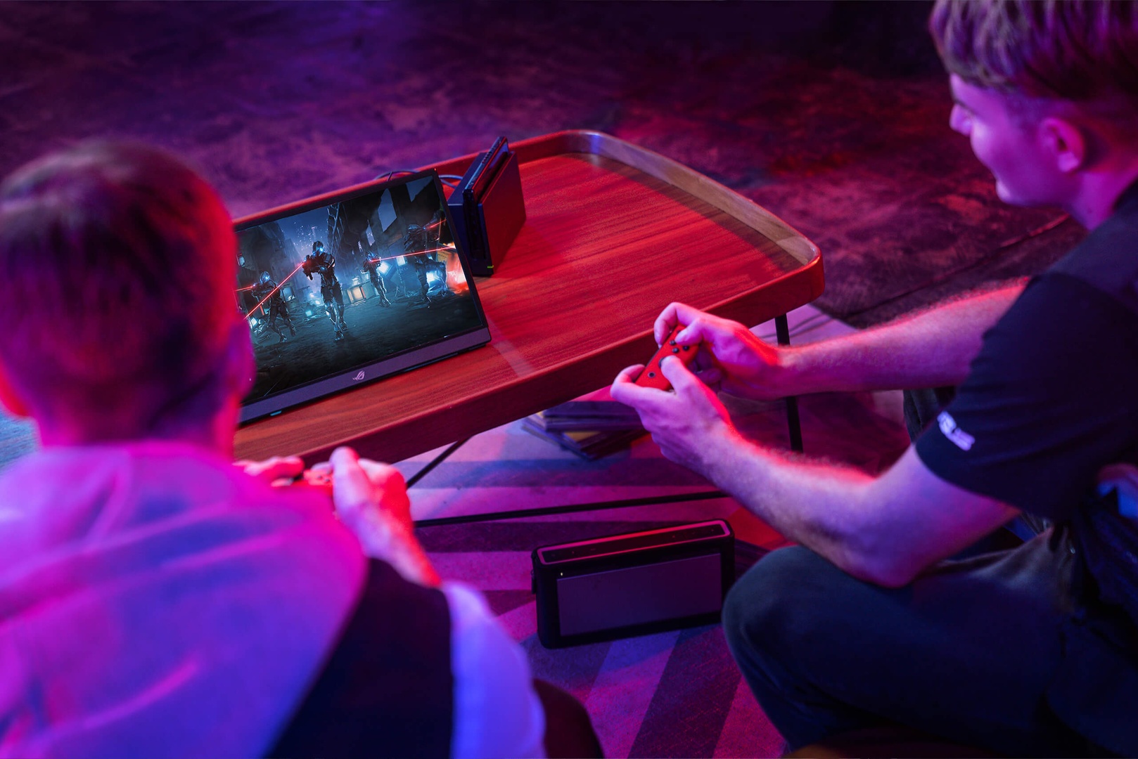 144 Hz portable gaming monitor paired with a handheld console