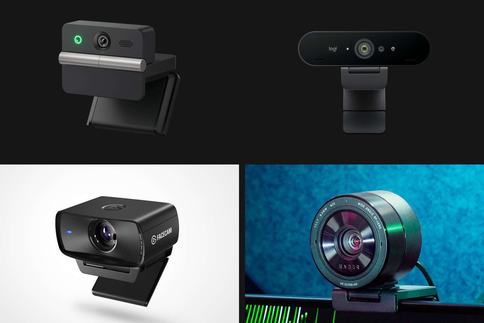 Four webcams of different sizes on a desk next to a gaming monitor